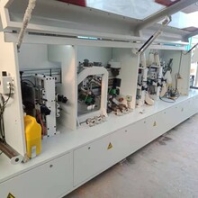 轉(zhuǎn)讓九成新的廣東雙修帶跟蹤全自動封邊機全新測孔機精密鋸
