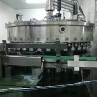 二手自動灌裝機(jī)封蓋機(jī)轉(zhuǎn)讓洛陽二手食品設(shè)備供應(yīng)飲料廠所需設(shè)備